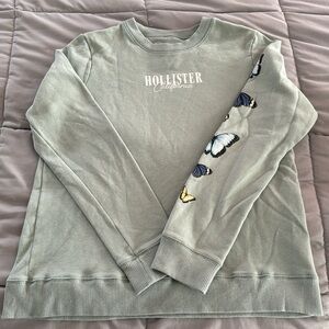 Hollister Sage left sleeve with butterflies size medium